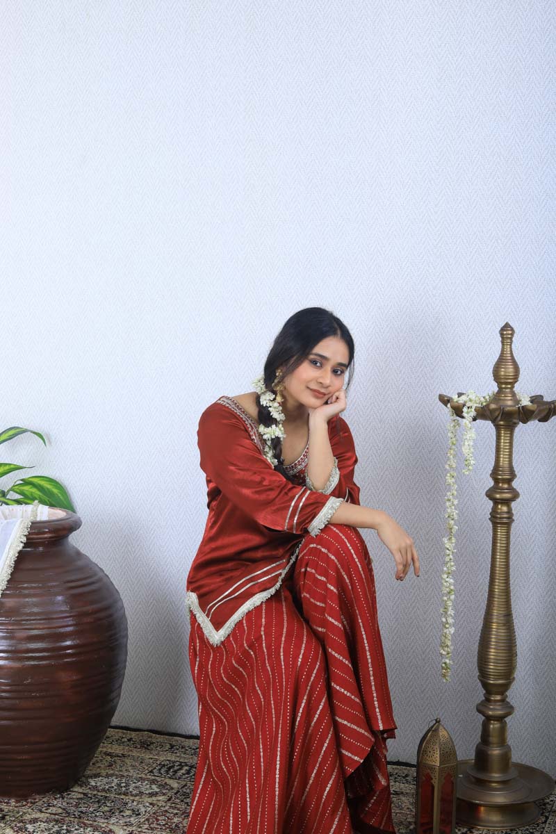 Maroon Strappy Indian Traditional Outfit which is perfect for ethnic occasions.